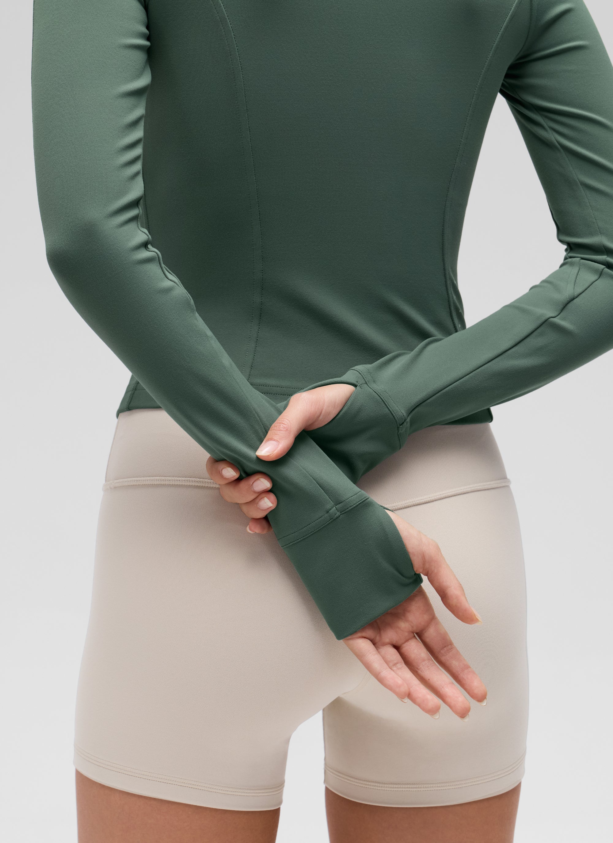 CRZ YOGA Pambabae Butterluxe Mga Panlabas na Damit na May Buong Zip na May Crop Pocket at Madilim na Forest Green